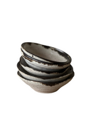 A set of mini bowls on a white background